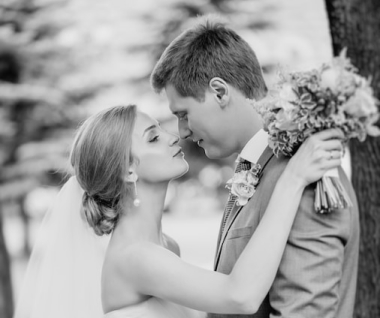 Bride and groom embrace