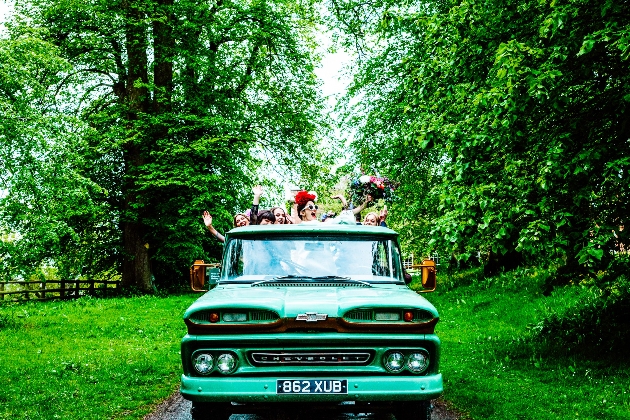 Bridal party in a car