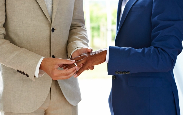 Couple exchanging rings