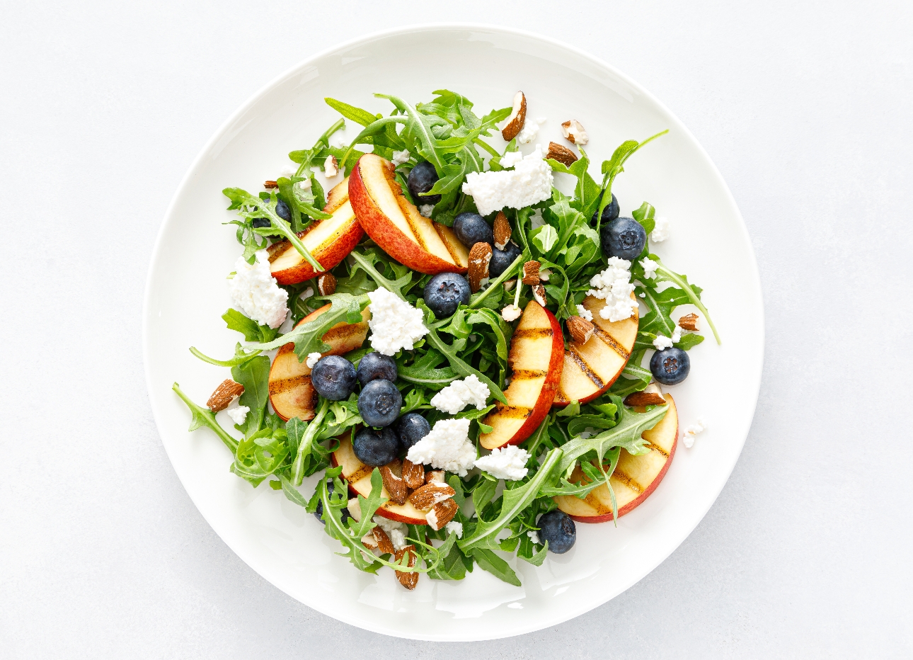 bowl of salad and fruit