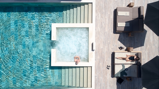 Birdseye view of a woman in a hot tub