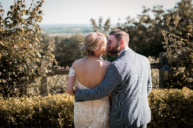 Bride and groom embracing