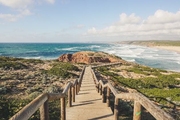 A bridge leading down to the sea