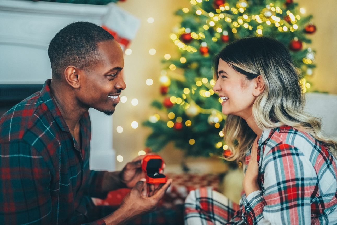 couple in pjs man proposing