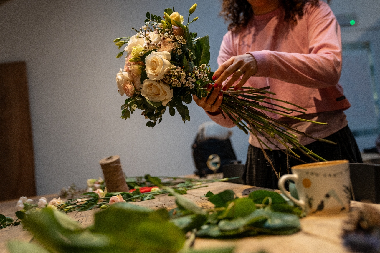 woman making bouquet